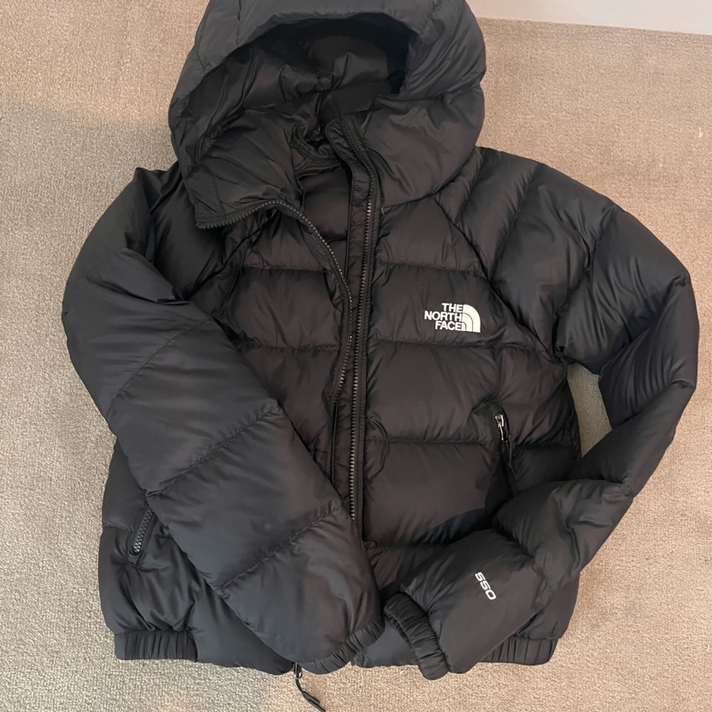 Black north face coat.